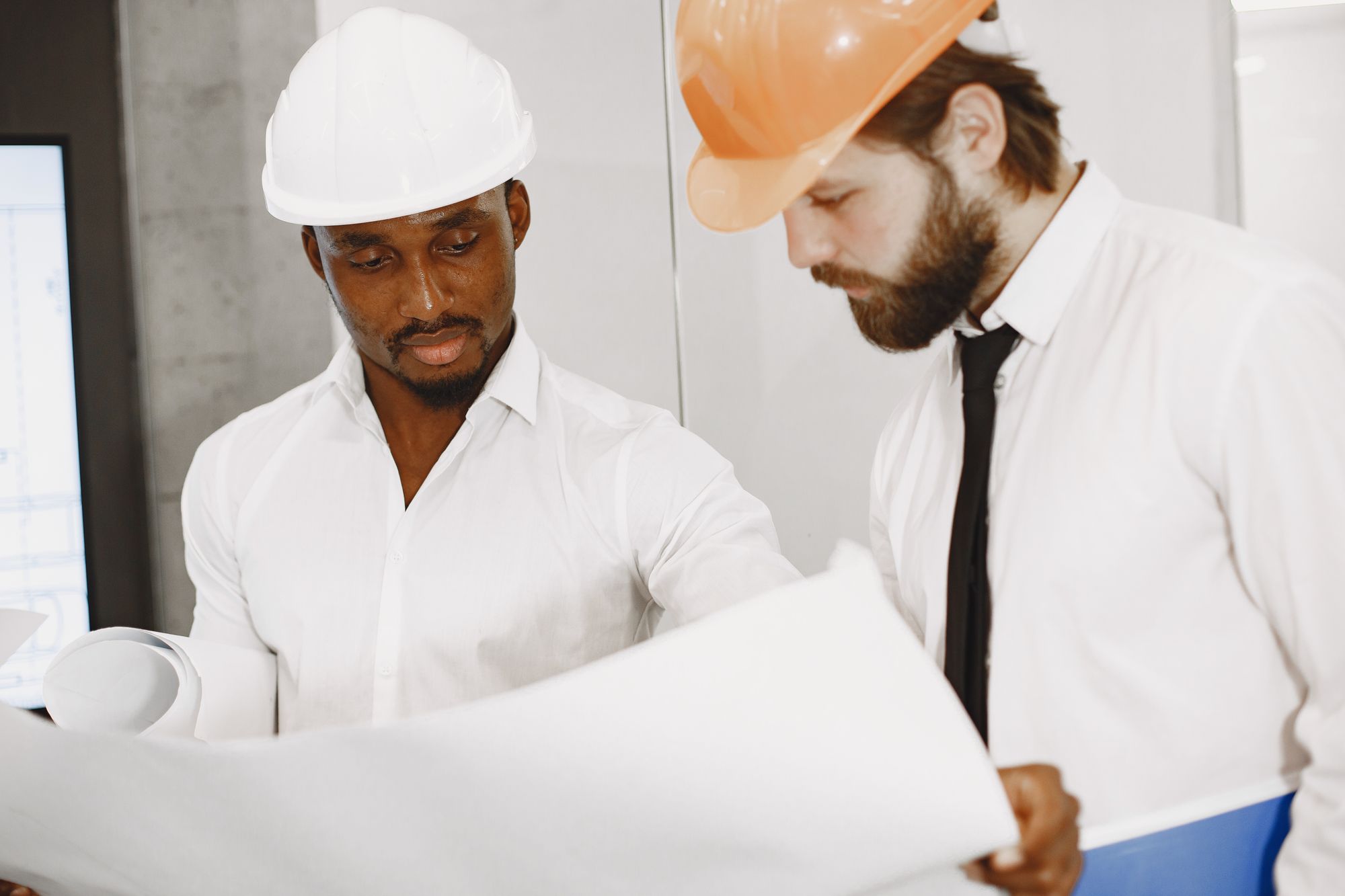 A site team reviewing plans together